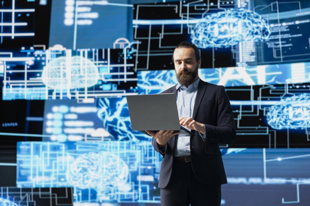 Tech savvy businessman reviewing AI brain programming for innovation Atera, Mex Servicios y Tecnología